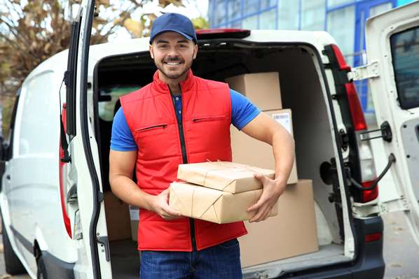 Delivery driver with parcels for customer