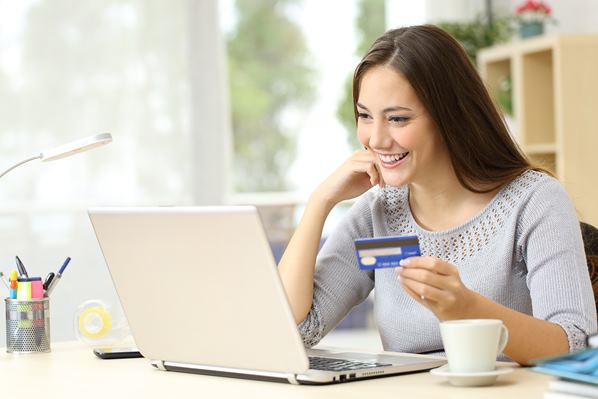 Customer speaking her credit card details when online shopping
