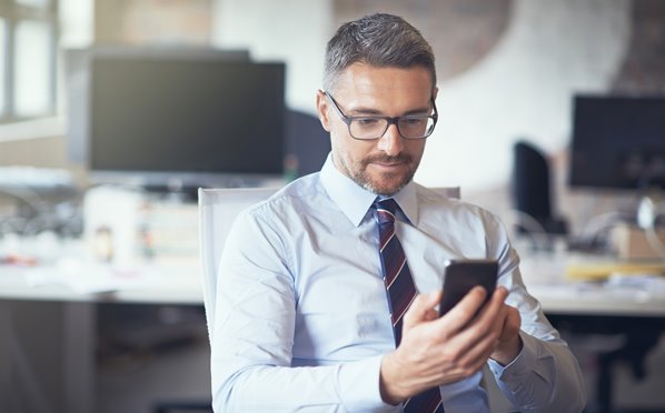 Business person using smartphone