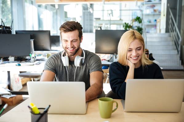 People working in an office on computers