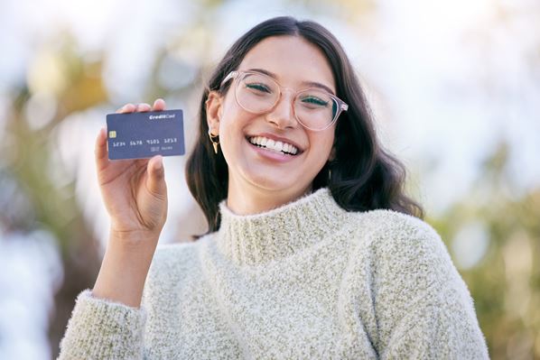 Customer holding a loyalty card