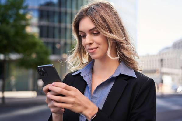 Women looking at smartphone