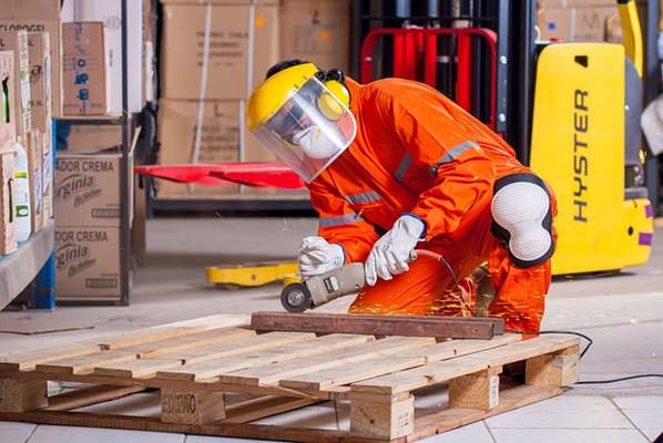 Employee using Industrial safety equipment