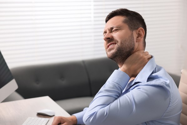 Office worker with painful neck