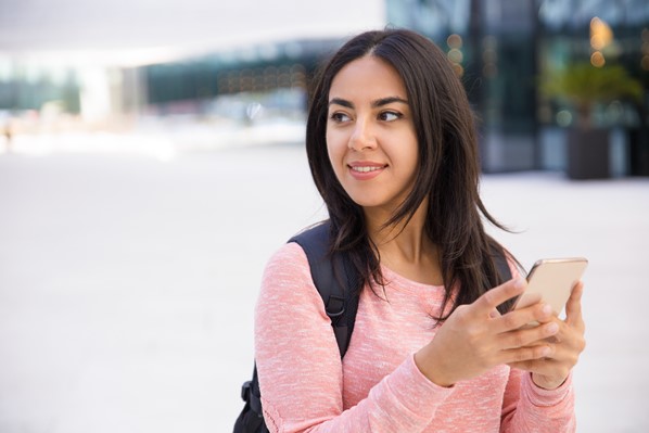 User filling in online survey on phone