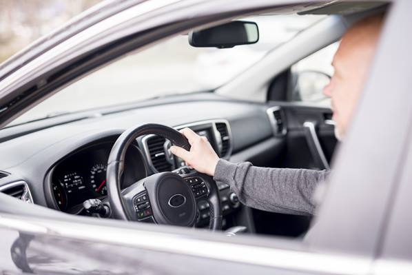 Man driving car