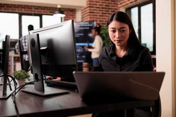 Computer programmer working in office