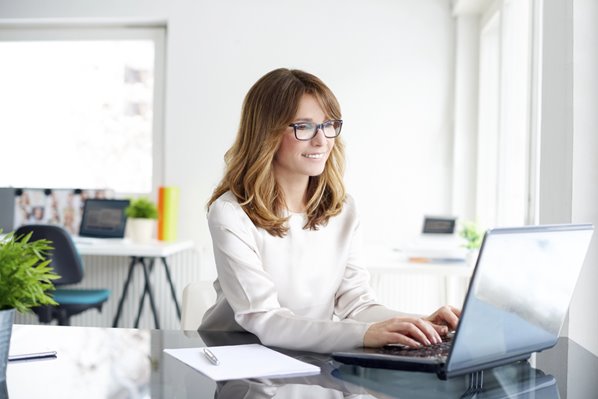 Women working in an office on a computer