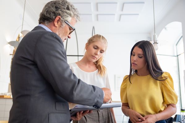 Lawyer with his clients