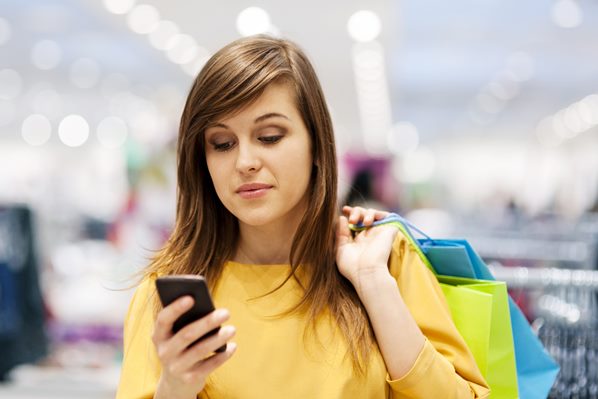 Women online shopping on her phone