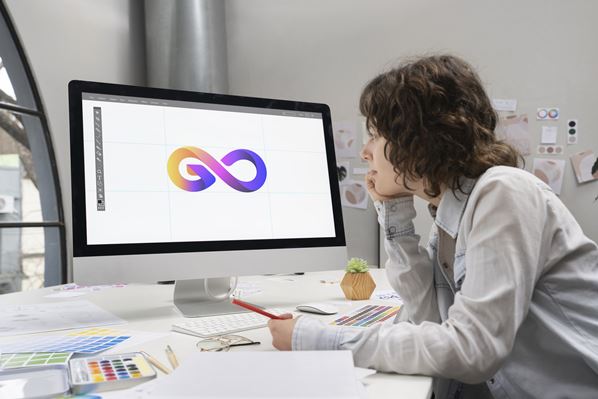 Graphic designer making a logo on her computer