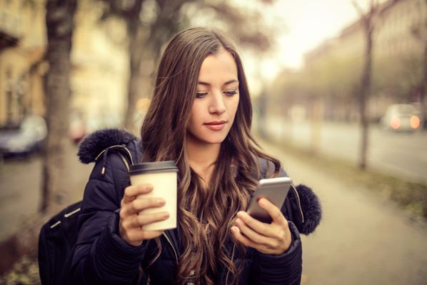 Customer using mobile phone 