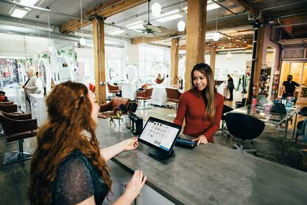 Customer paying at a digital payment point