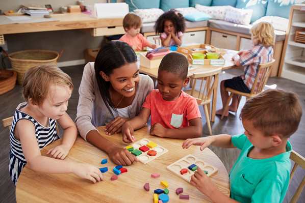 Teacher with her students