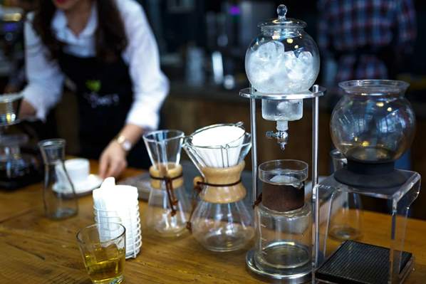 Barista preparing coffee for customers