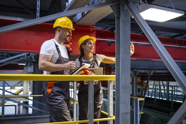 Strucural engineers inspecting a steel building