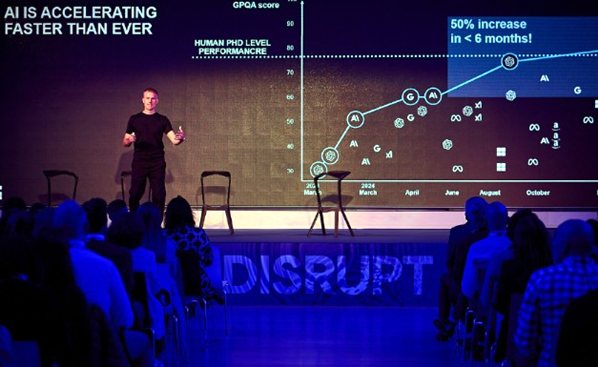 Sabio Chief AI Officer, Stu Dorman, addresses delegates at Sabio's annual Disrupt event