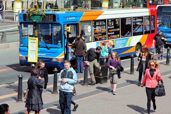 A stagecoach bus and passengers